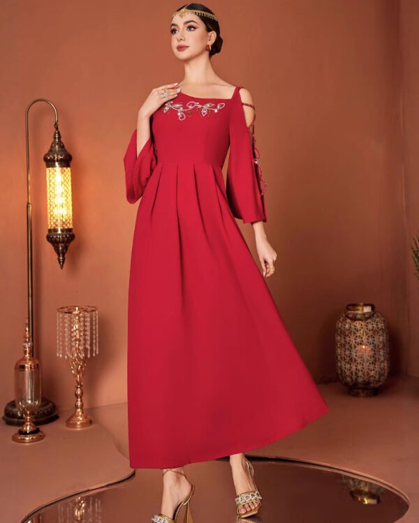 Hand-Embellished Off-Shoulder Gown.