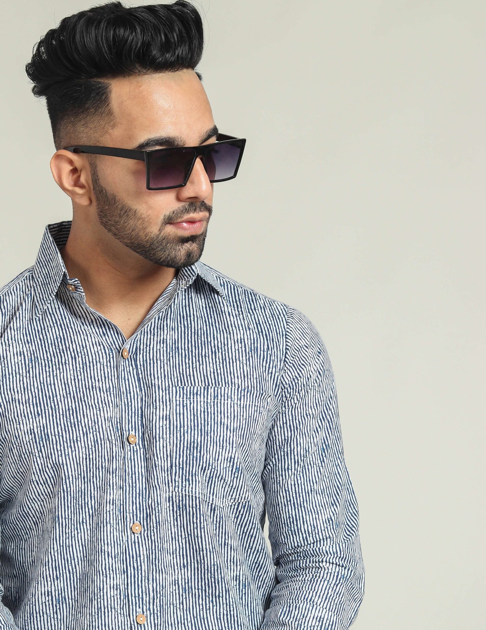 Men wearing blue and white striped cotton full-sleeve shirt