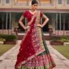 Dark green Tussar silk lehenga choli with Patola print and foil work for wedding wear