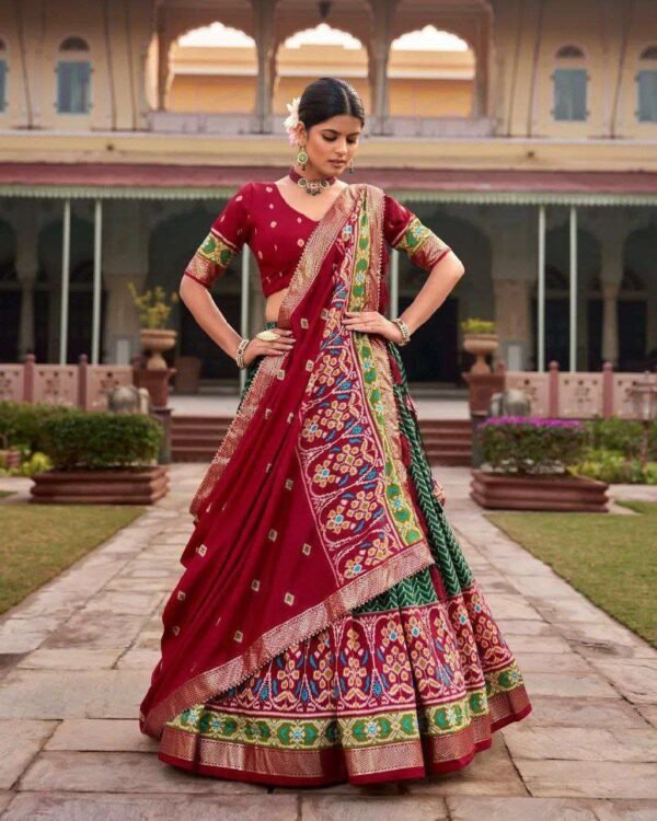 Dark green Tussar silk lehenga choli with Patola print and foil work for wedding wear