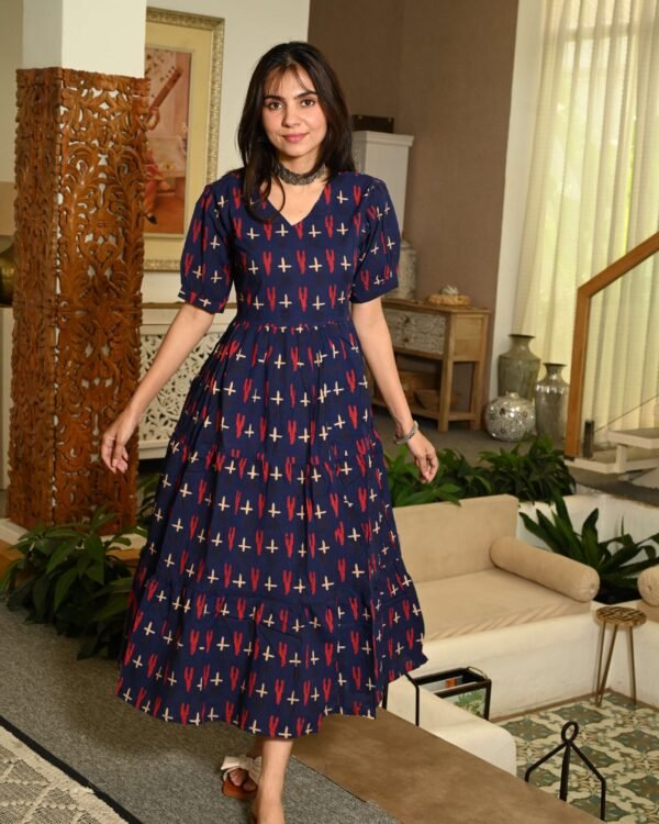 Woman wearing navy blue printed cotton Anarkali maxi dress with puff sleeves