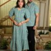 Couple wearing matching sage green cotton dress and shirt with arrow print