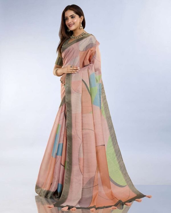 Teal green and mauve pink linen saree with geometric patterns and floral printed pallu