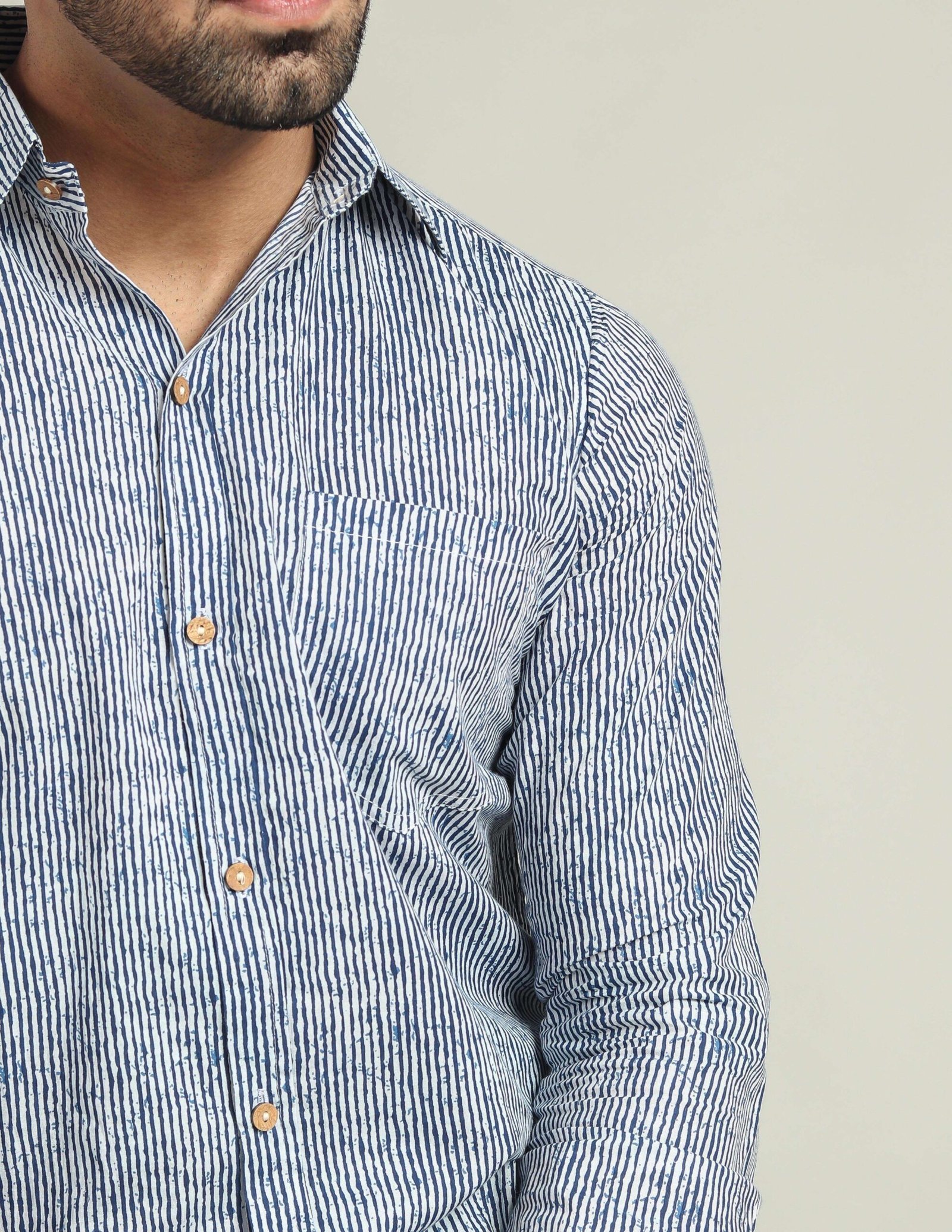 Men wearing blue and white striped cotton full-sleeve shirt
