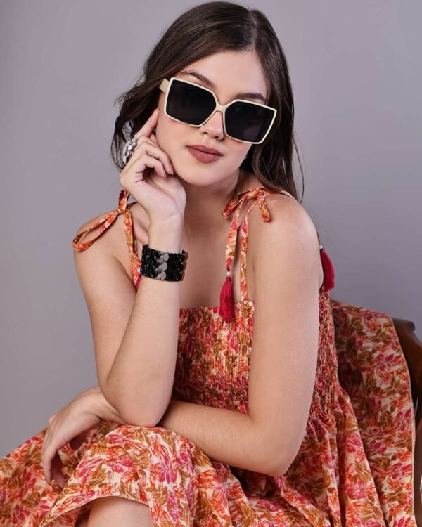 Multicolor floral cotton midi dress with handkerchief hem and tie-up shoulder straps