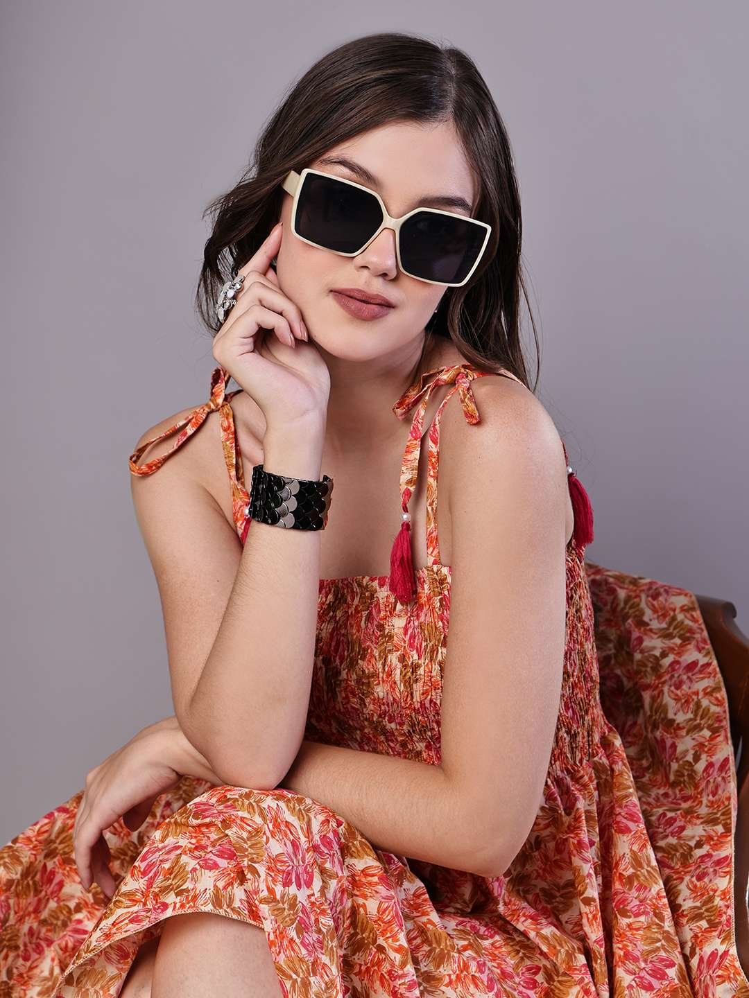 Multicolor floral cotton midi dress with handkerchief hem and tie-up shoulder straps